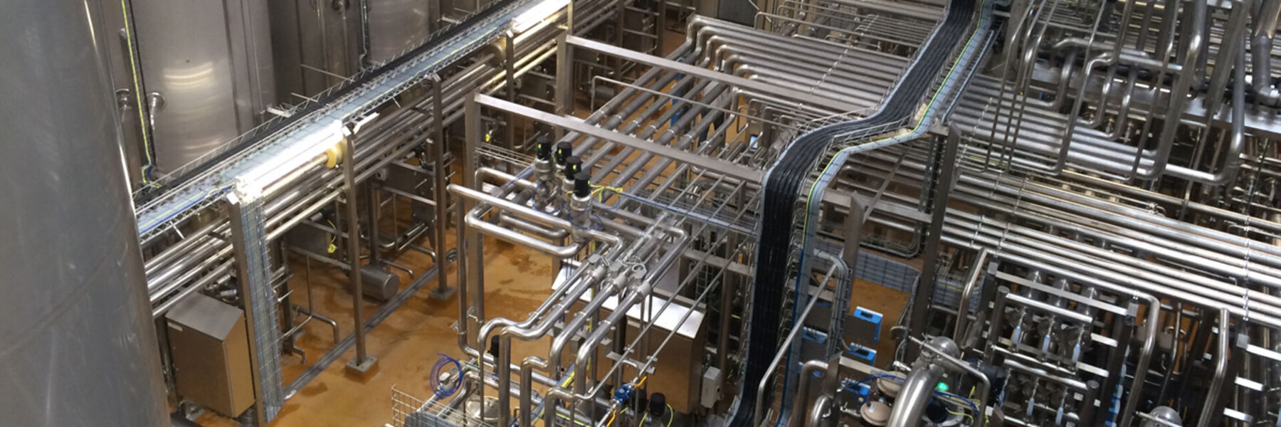 Process piping installation in a manufacturing facility